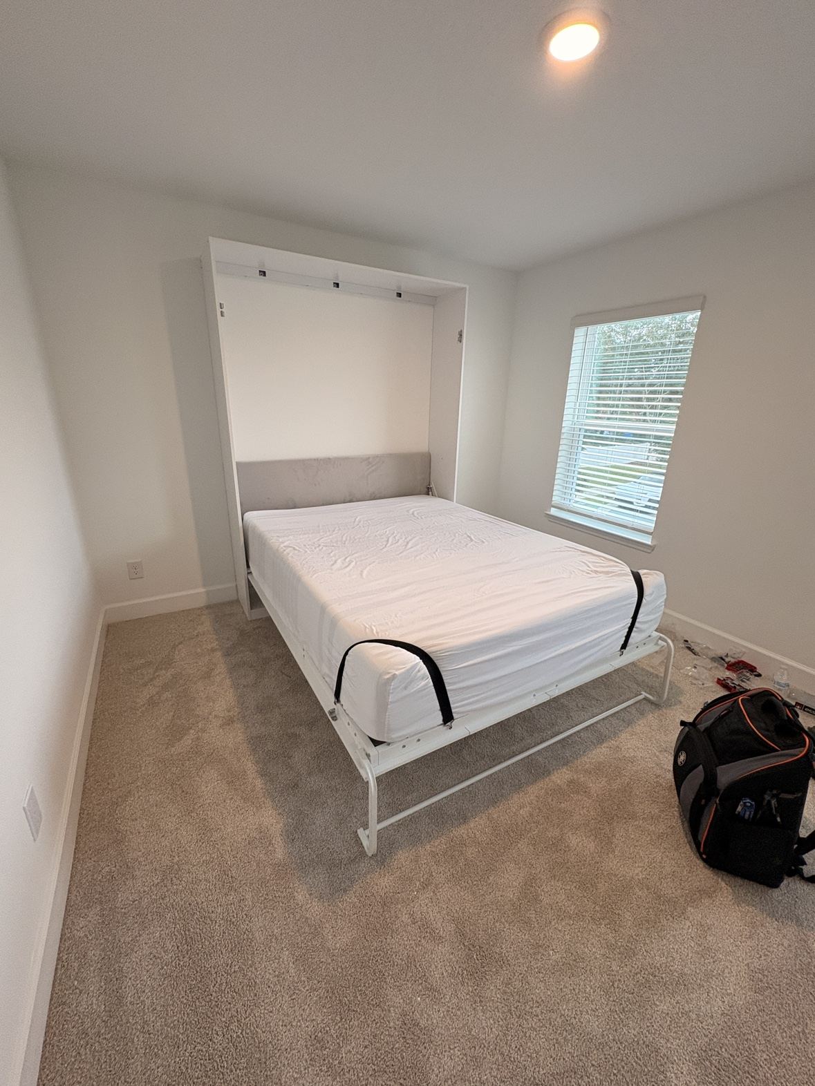 Murphy bed folded down and ready to use